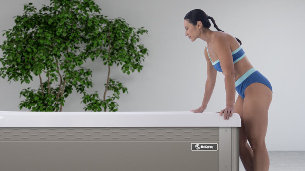 hotspring-coldplunge-vigor-woman-viewing-water-indoors